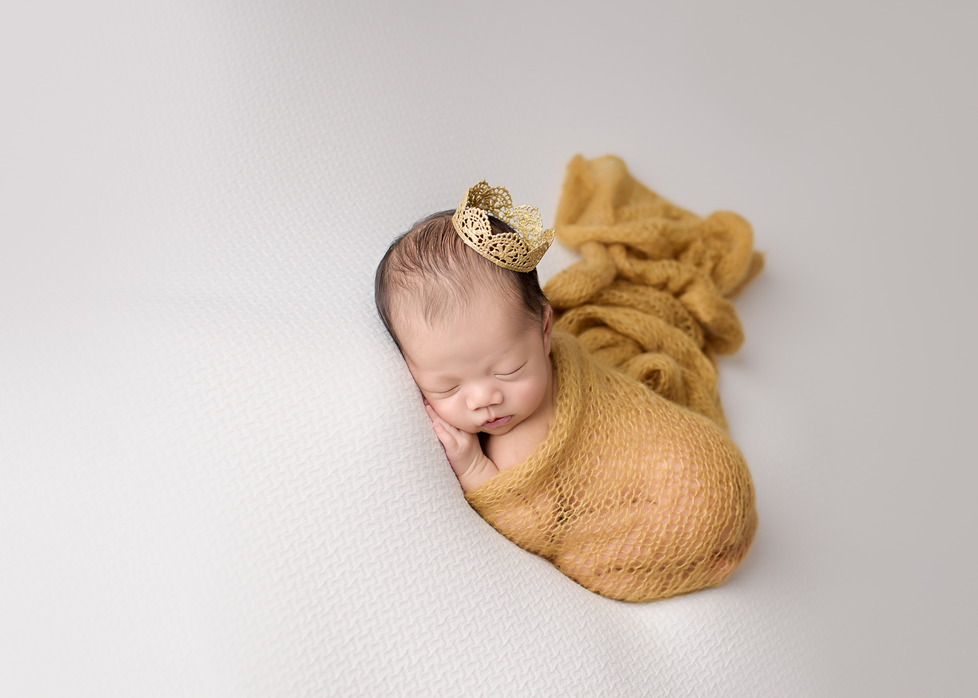 Calgary Newborn Photographer Baby Wearing Crown