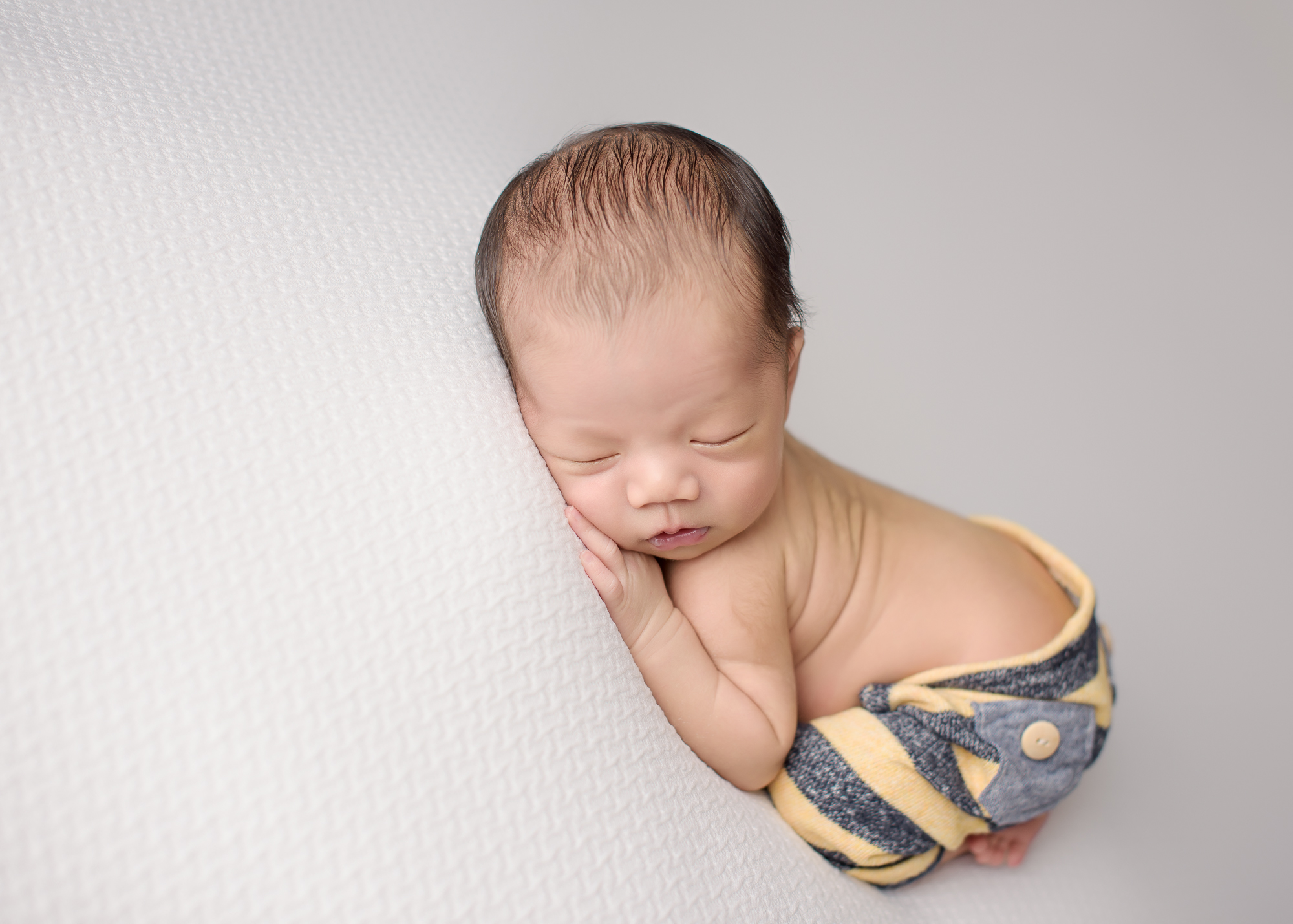 Calgary Newborn Photographer Baby Wearing Pants