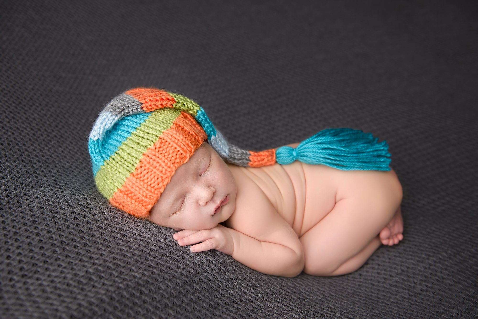 Calgary Newborn Photography Grey Background Colourful Hat