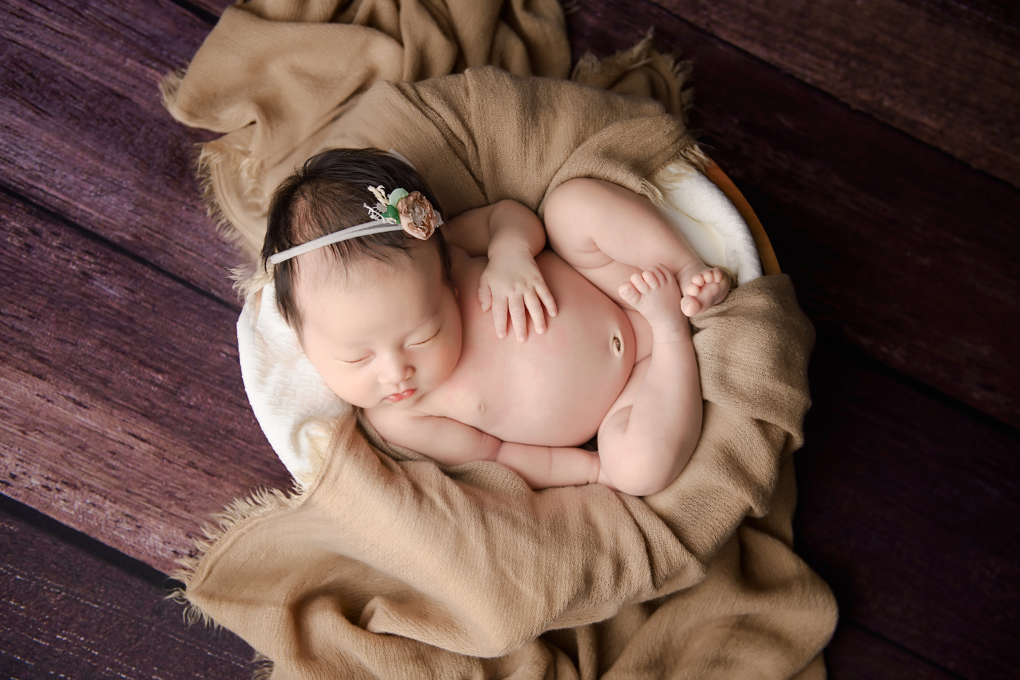 Calgary Newborn Photographer Baby On A Bowl With Blankets