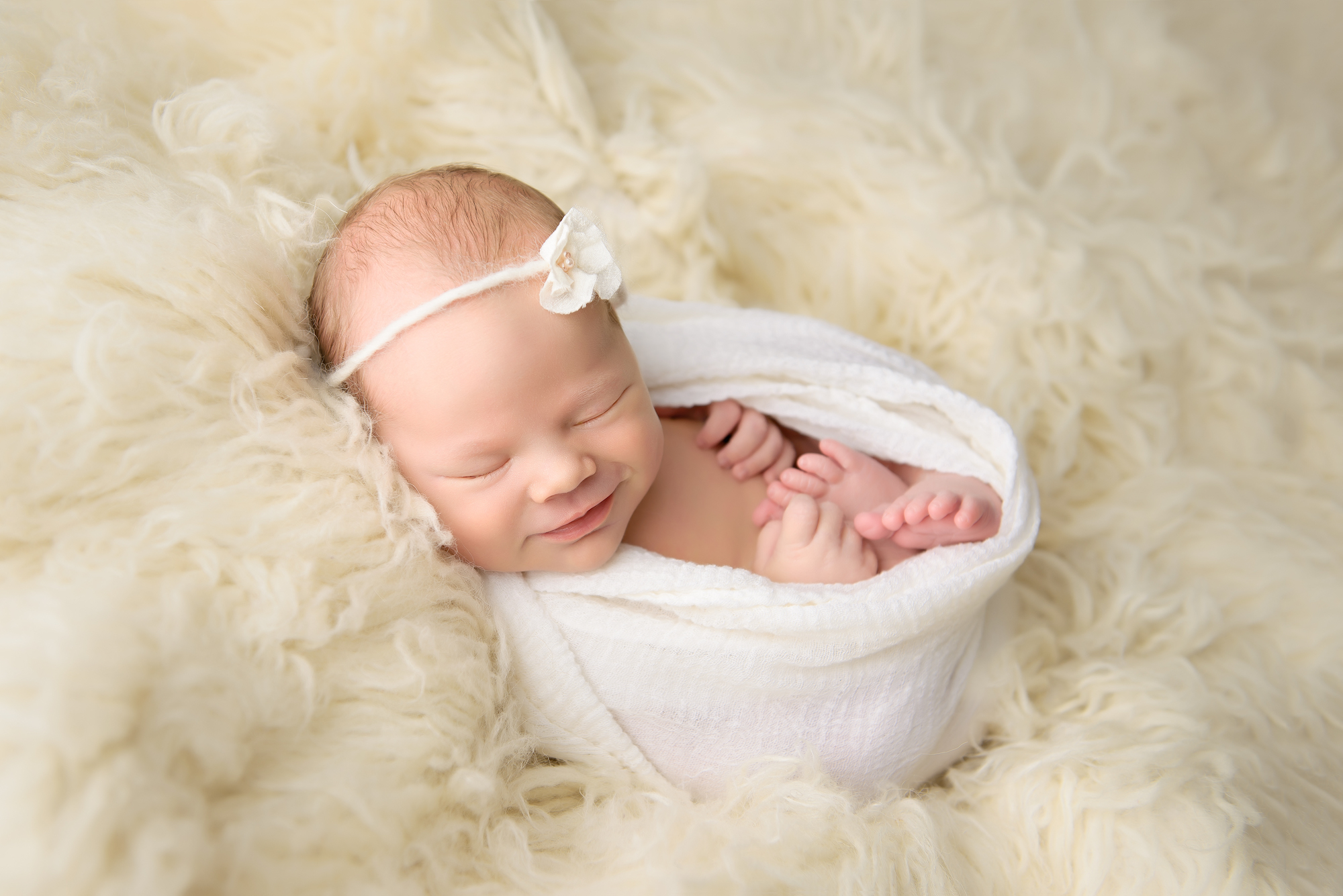 Calgary Newborn Photographer Baby Smiling