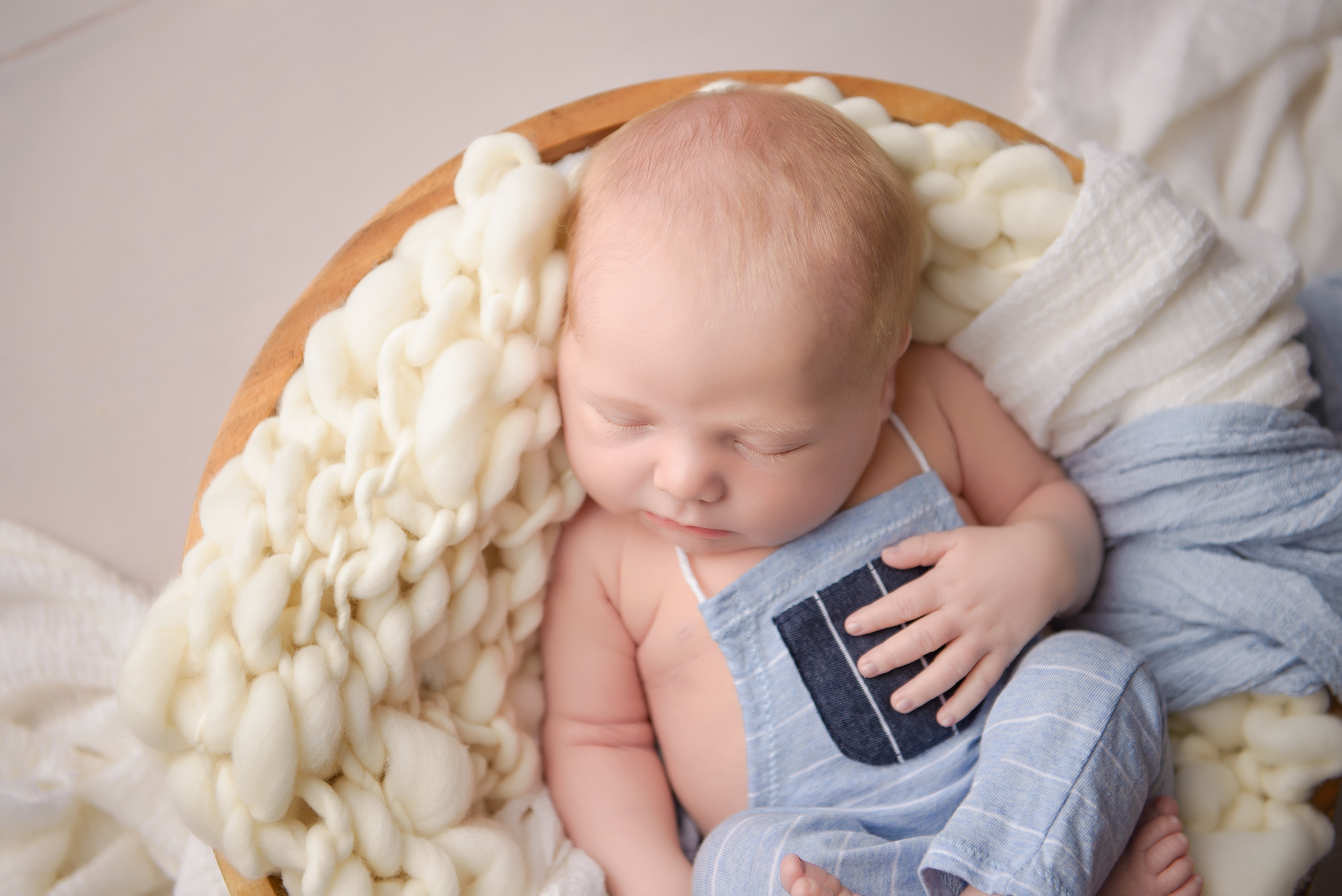 Newborn Photographer Baby Sleeping On A Bowl