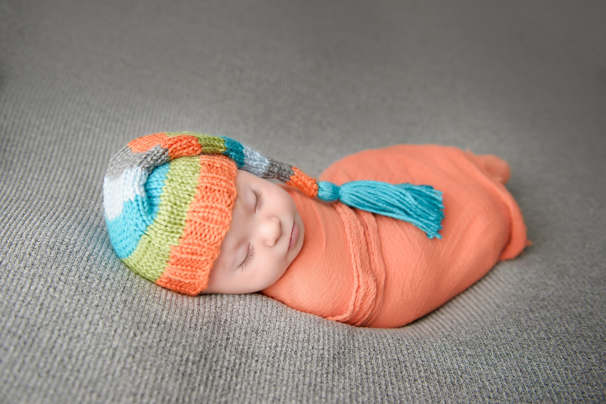 Calgary Baby Photographer Colourful Hat With Orange Wrap