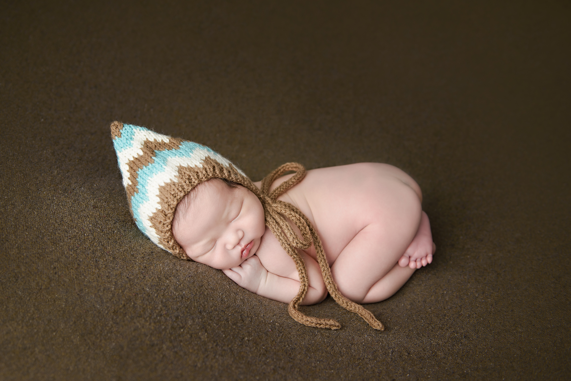 Newborn Photography Calgary Baby Wearing Hat