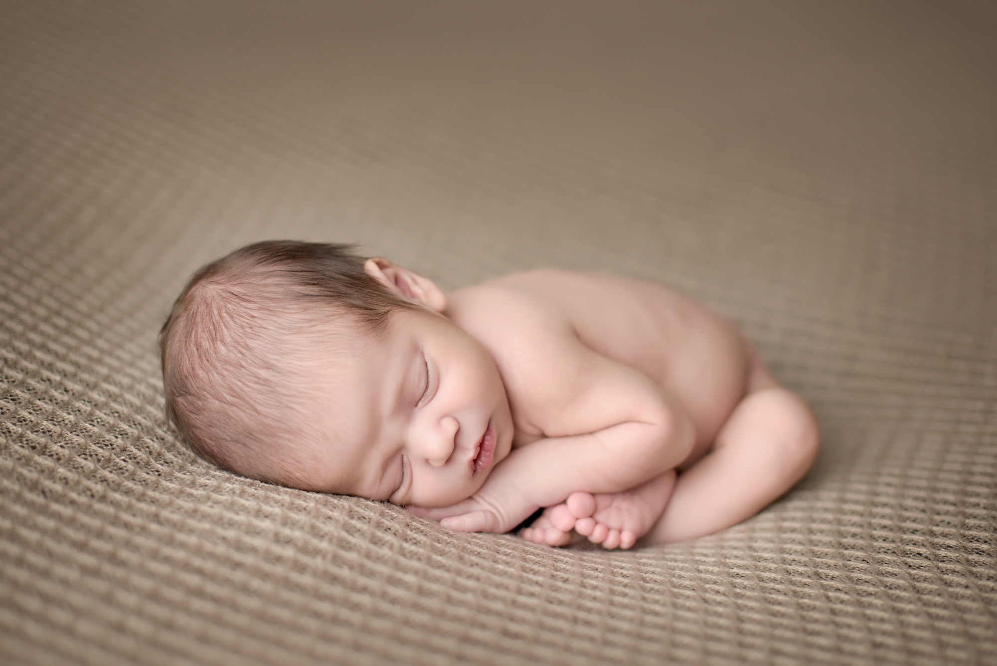 Calgary Newborn Photographer Naked Baby Brown Backdrop