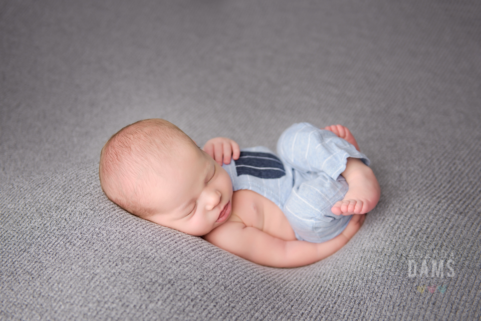 Amanda Dams Newborn Photography Baby Boy Wearing Clothes
