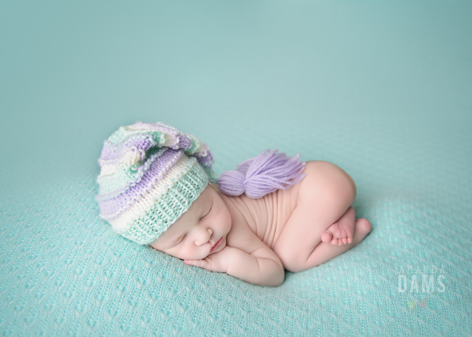 Newborn Photography Calgary Sleeping With Colourful Hat