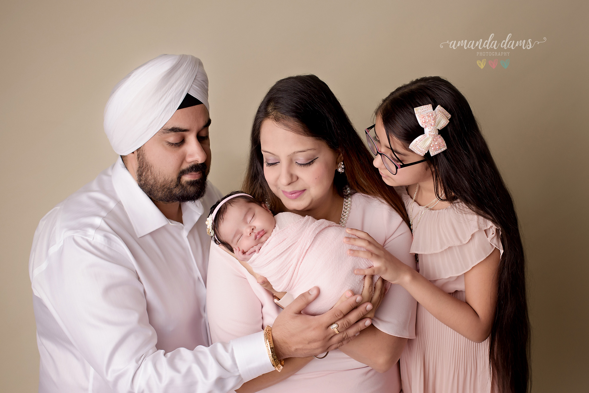 Family Photography Calgary Amanda Dams Photography Family Holding Newborn Baby