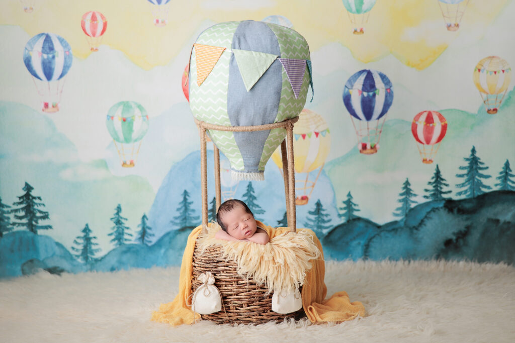 amanda dams photography baby eason 17 newborn photography baby on hot air balloon