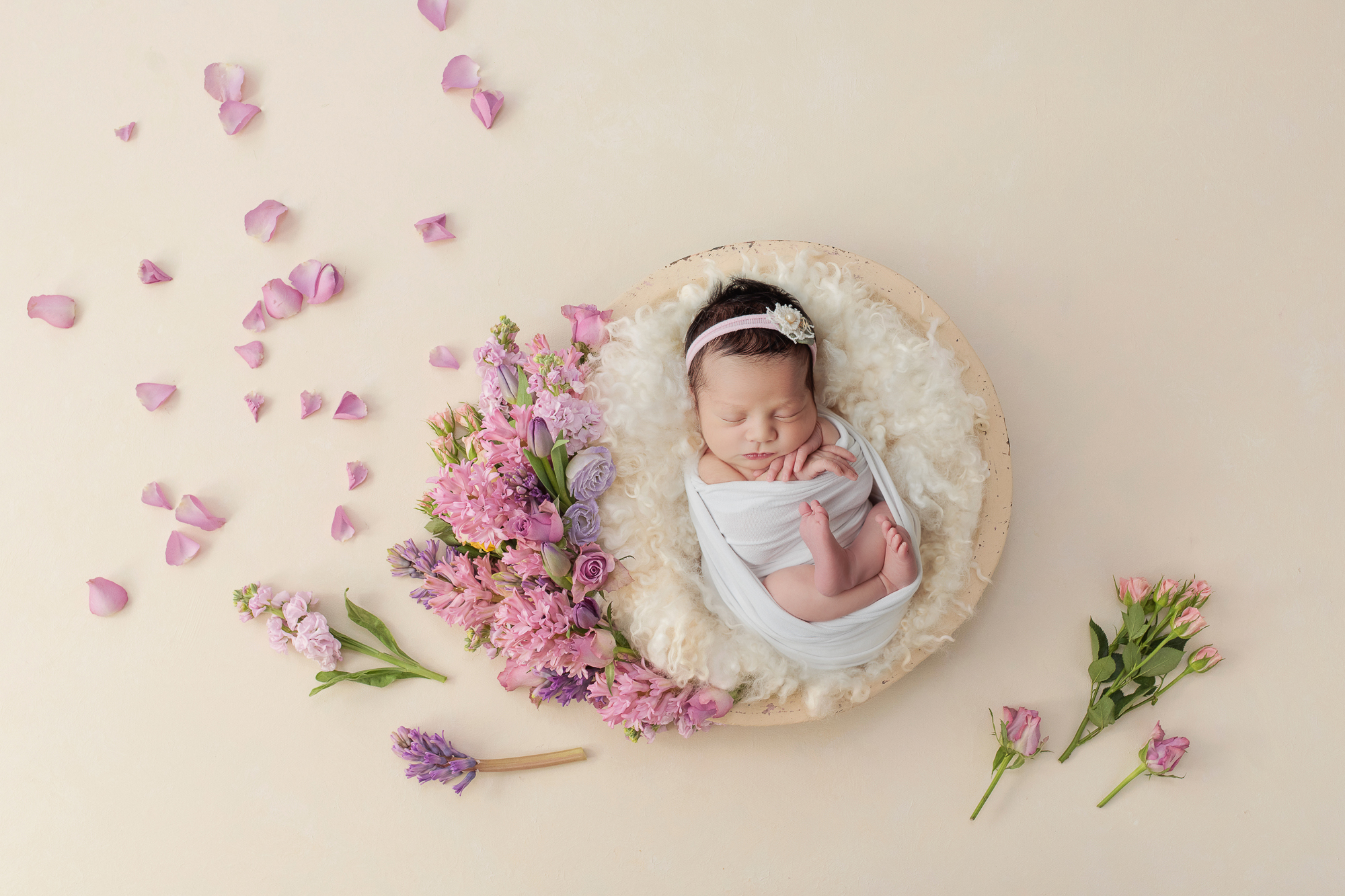 newborn photography baby girl with pink flowers