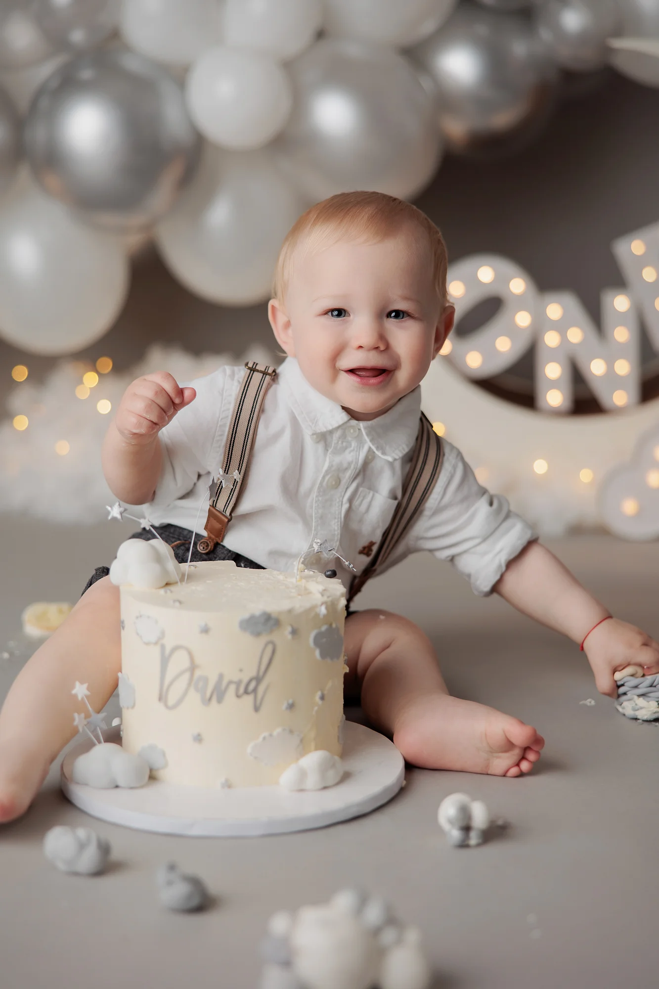 Baby Boy having cake for a cake smash photography