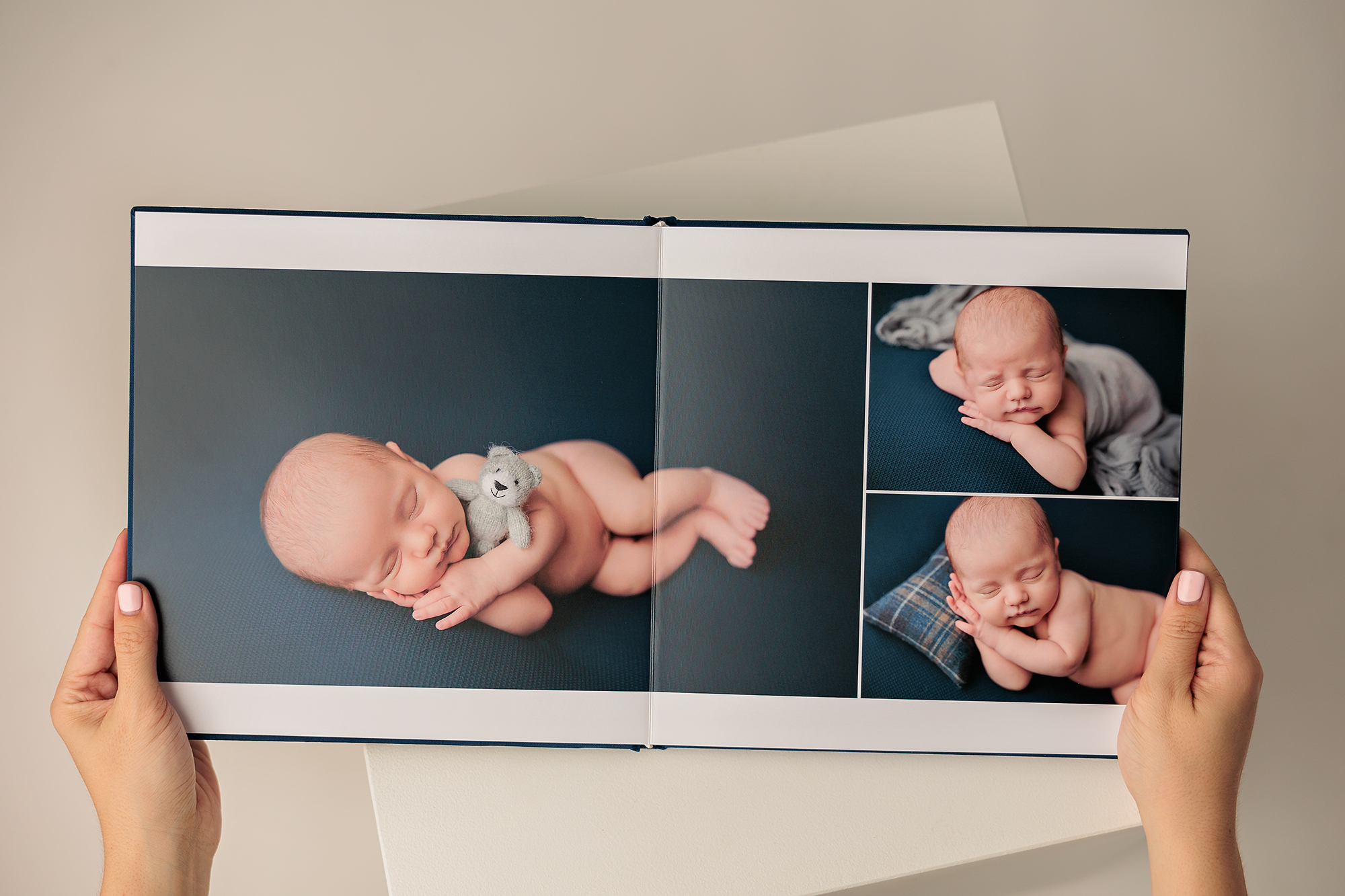 premium fine art acrylic album of a newborn photography session by amanda dams