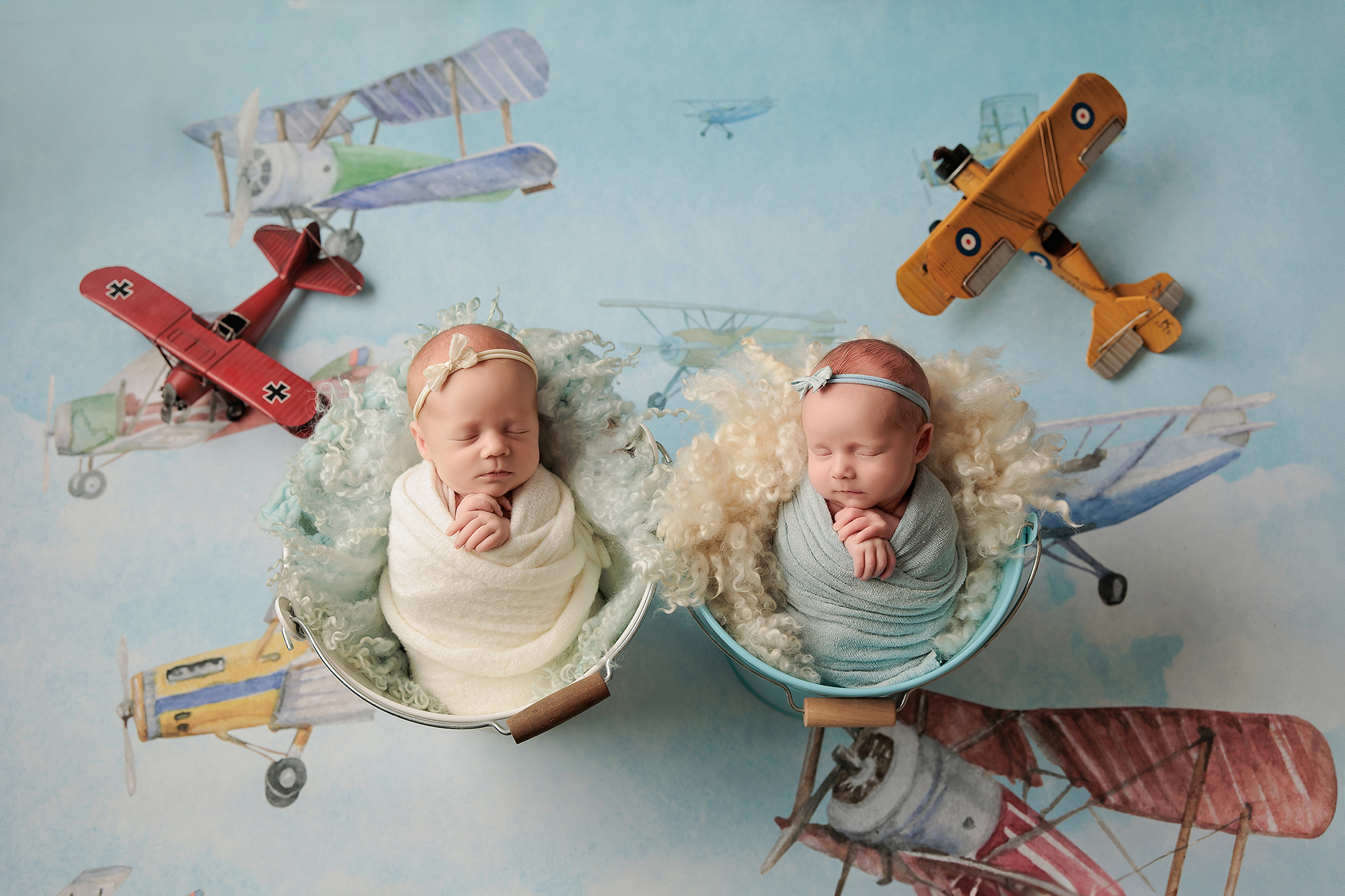 Awake one-month-old baby with open eyes during relaxed newborn photos after two weeks old