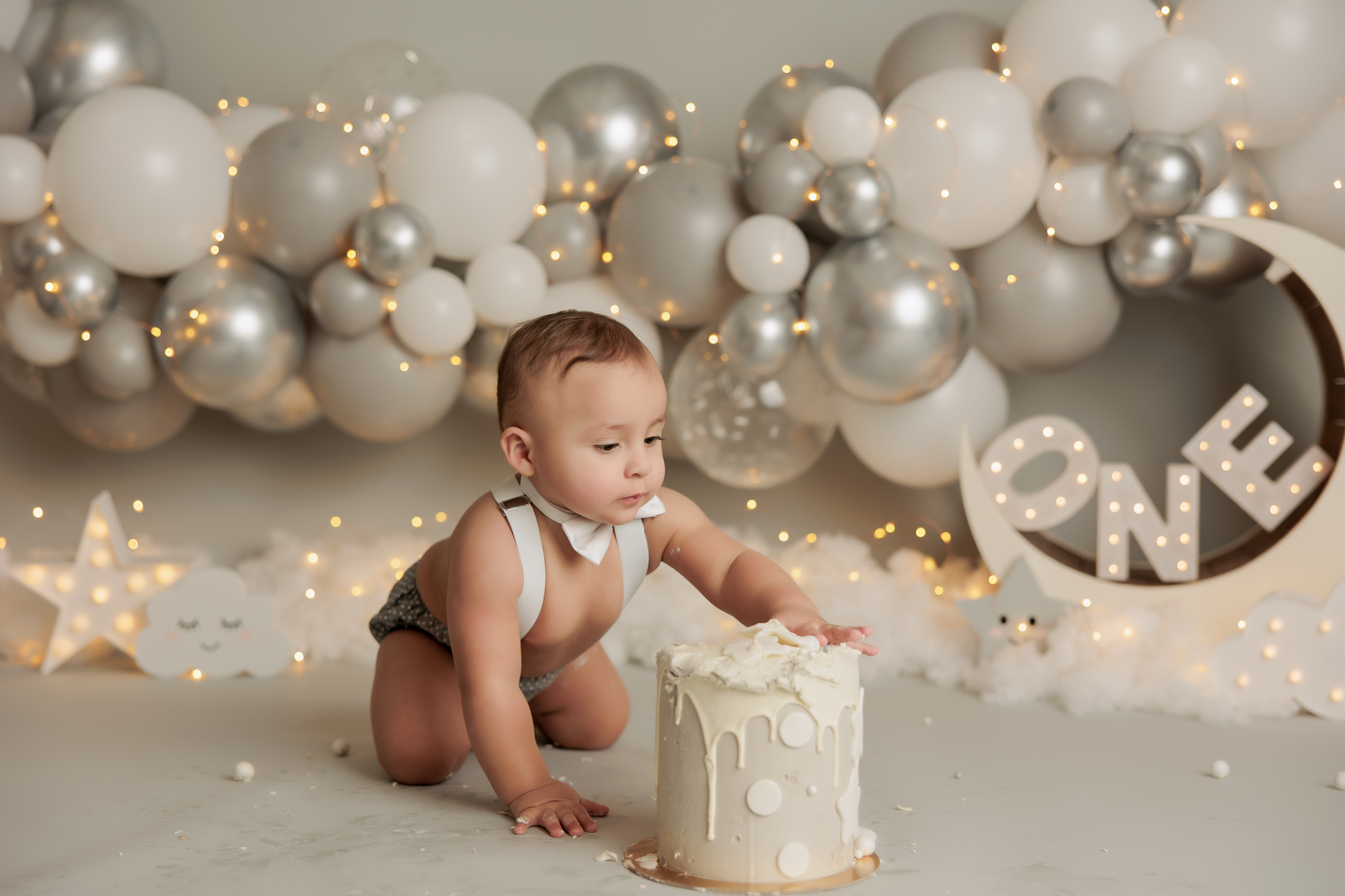 silver star clouds theme cake smash photoshoot in Calgary