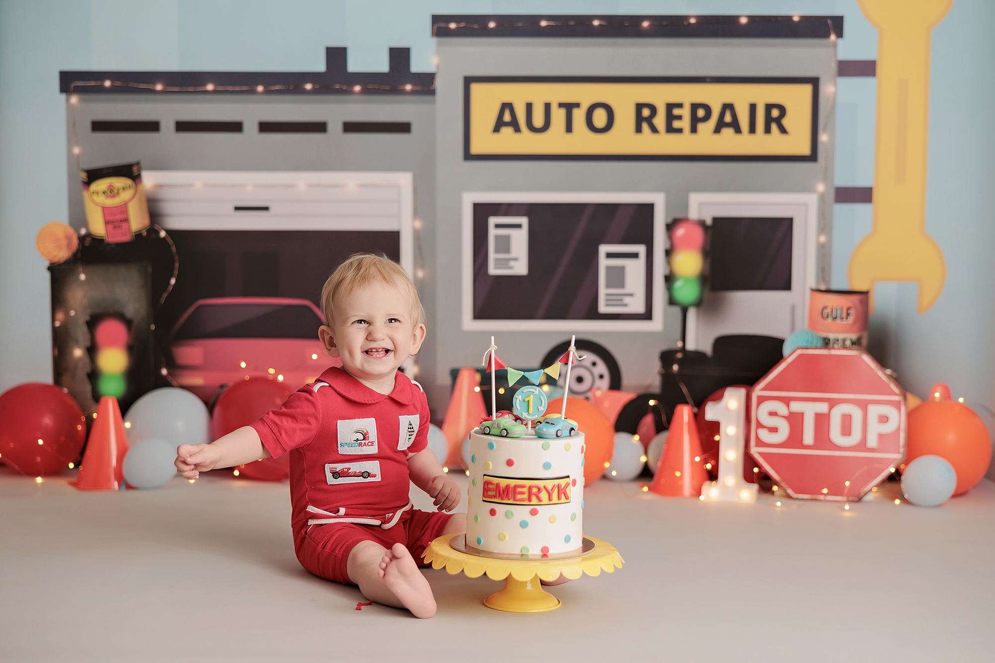 auto shop theme cake smash photoshoot in Calgary